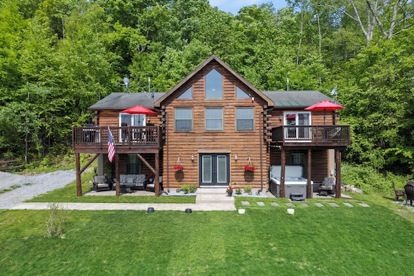 Log home with 2 decks overlooking Lake George and the mountains.