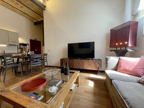Apartamento Deluxe | Zona de estar