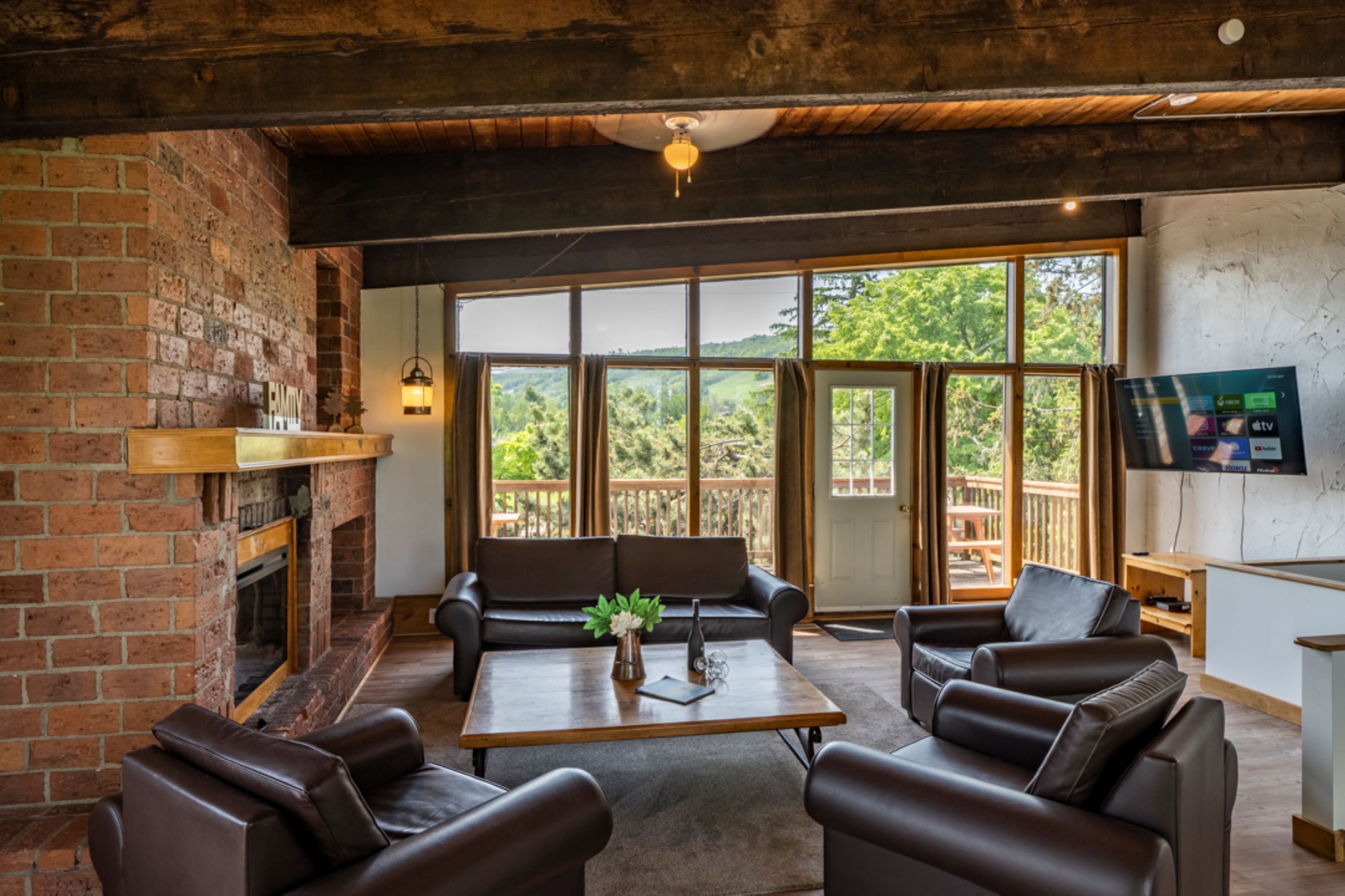 Classic Chalet, 6 Bedrooms, Hot Tub | Living area | 42-inch Smart TV with cable channels, fireplace, table tennis