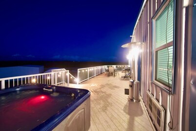 Come stay at this one of kind  Airplane hanger that overlooks a runway. 