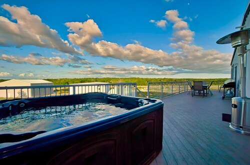 Come stay at this one of kind  Airplane hanger that overlooks a runway. 