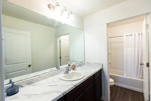 Hair dryer, towels, soap, shampoo