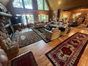 Smart TV, fireplace, books, stereo