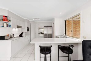 Fridge, microwave, stovetop, dishwasher - Cookies Beach House (South Durras)