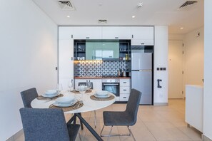 Fridge, microwave, oven, stovetop - Socio Tower 2 - Neat Two Bedroom (Dubai Hills)
