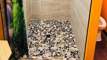 Shower, towels, soap, toilet paper