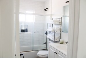 Hair dryer, towels, soap, toilet paper