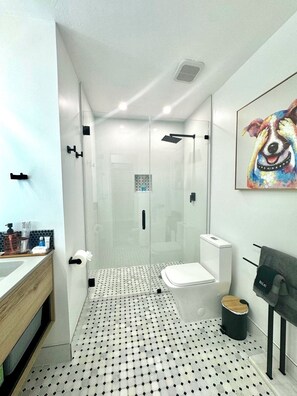 Shower, hair dryer, towels, soap