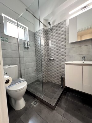 Shower, free toiletries, hair dryer, slippers - Allure Athens Urban Suites (Athens)