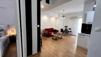 Apartamento | Área de estar | TV LED 55 polegadas com canais a cabo