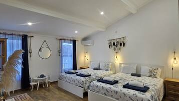 3 slaapkamers, een strijkplank/strijkijzer, reisbedje, gratis wifi