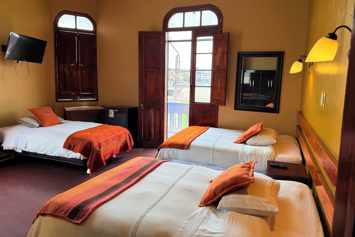 Chambre Triple Classique | Literie de qualité supérieure, couette en duvet d'oie, draps fournis