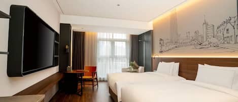 Ylelliset vuodevaatteet, untuvapeitot, ilmaiset minibaarituotteet