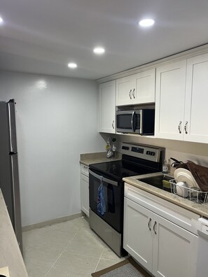 Fridge, microwave, oven, stovetop - Delightful centrally located Simpson Bay Yacht Club condo. (Simpson Bay)