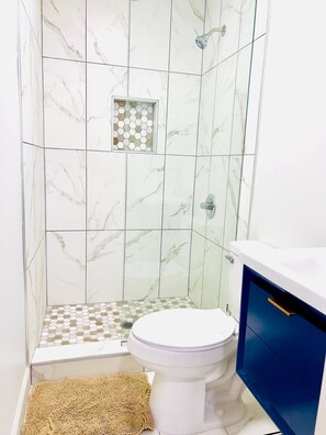 Hair dryer, towels, soap, shampoo