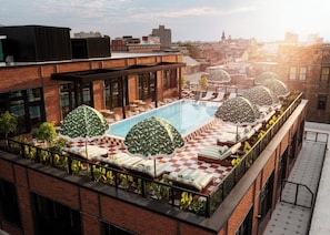 Outdoor pool, open 8:00 AM to 10:00 PM, pool umbrellas, sun loungers