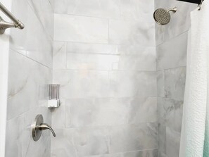 Hair dryer, towels, soap, shampoo