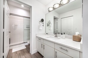 Shower, hair dryer, towels