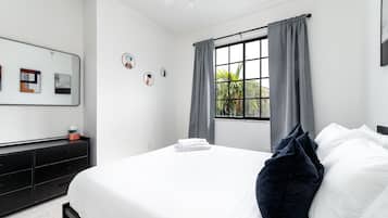 2 bedrooms, desk, iron/ironing board, travel crib