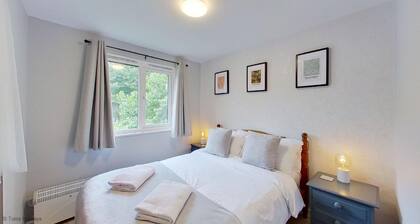 Offering comfortable living space for up to four guests within the leafy grounds of Tolroy Manor