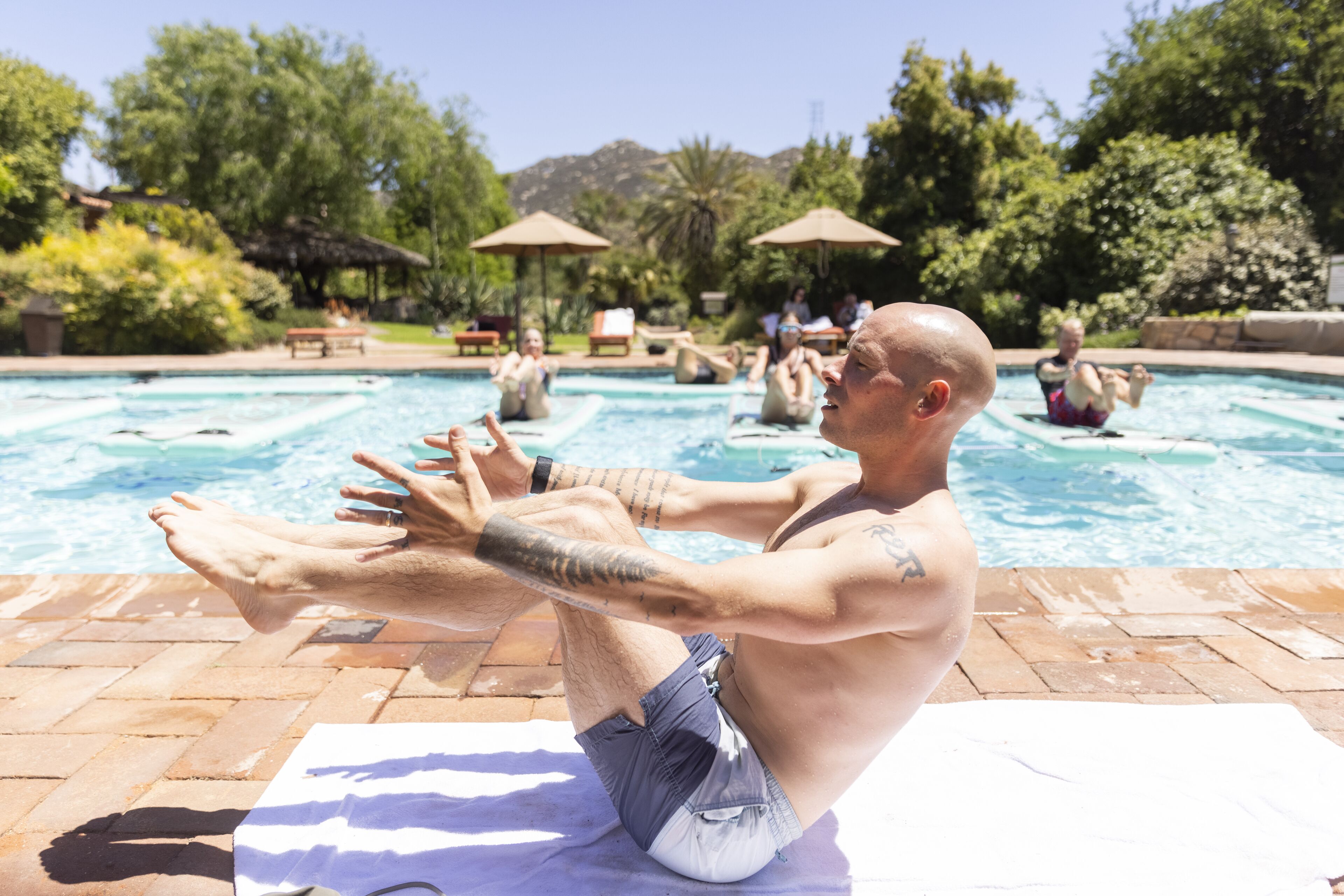4 outdoor pools, open 7:00 AM to 7:00 PM, pool umbrellas, sun loungers