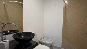 Standard Apartment, 1 Double Bed | Bathroom | Rainfall showerhead, towels