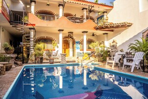 2 outdoor pools, pool umbrellas, sun loungers