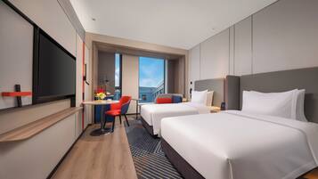 Standard Room, 2 Twin Beds, Courtyard View | Down comforters, in-room safe, desk, laptop workspace