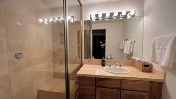 Eco-friendly toiletries, hair dryer, towels, soap