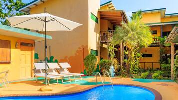 Outdoor pool, open 9:00 AM to 9:00 PM, pool umbrellas, sun loungers