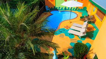 Outdoor pool, open 9:00 AM to 9:00 PM, pool umbrellas, sun loungers