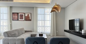 Appartement Design, 3 chambres | Coin séjour | Télévision à écran plat