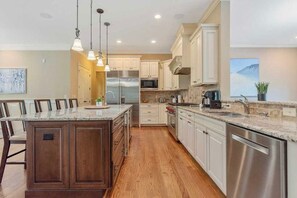 Fridge, microwave, oven, stovetop - Luxury lake-front family home with pool! (Apex)