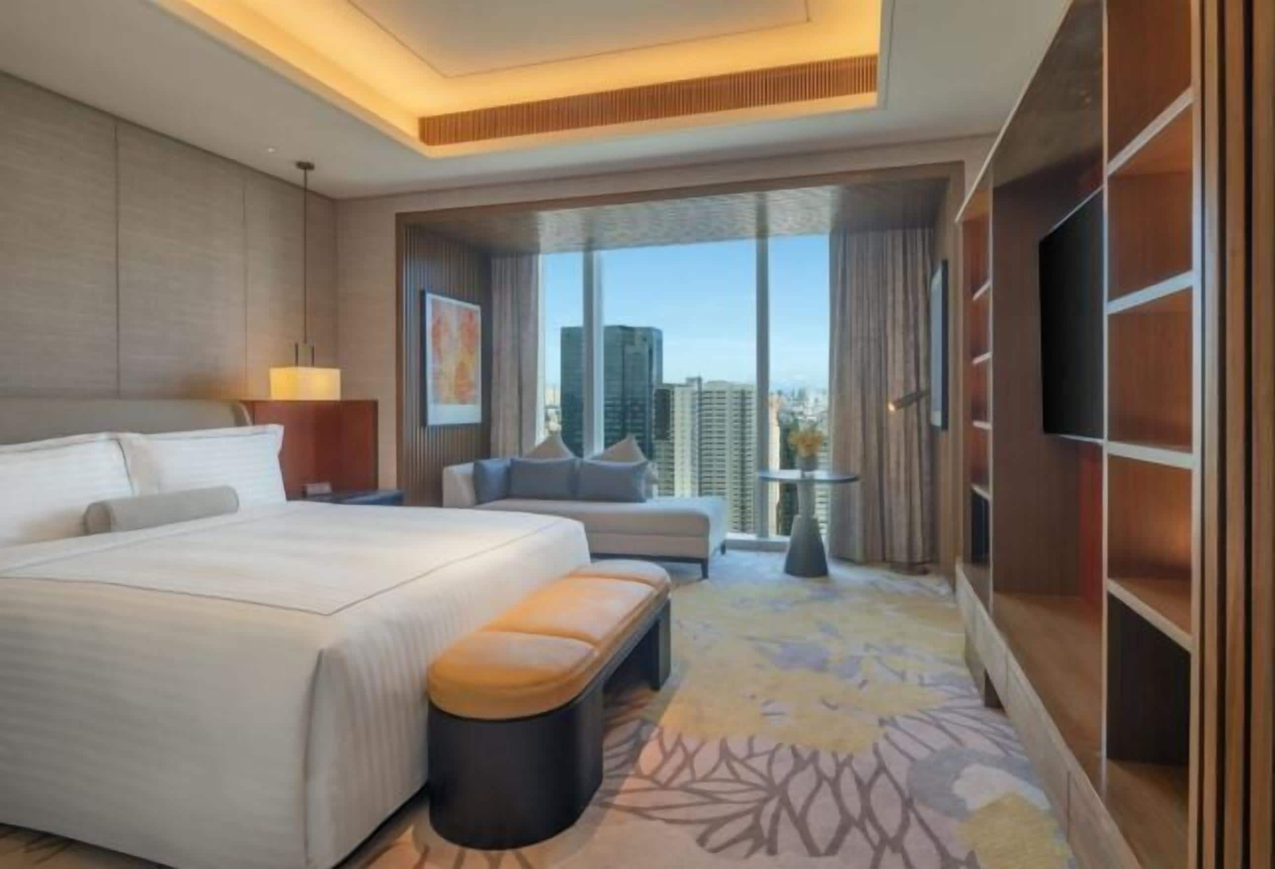 Luxe beddengoed, donsdekens, een minibar, een kluis op de kamer