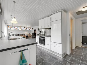 Fridge, oven, dishwasher, high chair