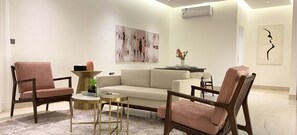 Design Apartment, 3 Bedrooms | Living area | Flat-screen TV - Kease Mughrizat C-1 Royal touch  GZ57 (Riyadh)