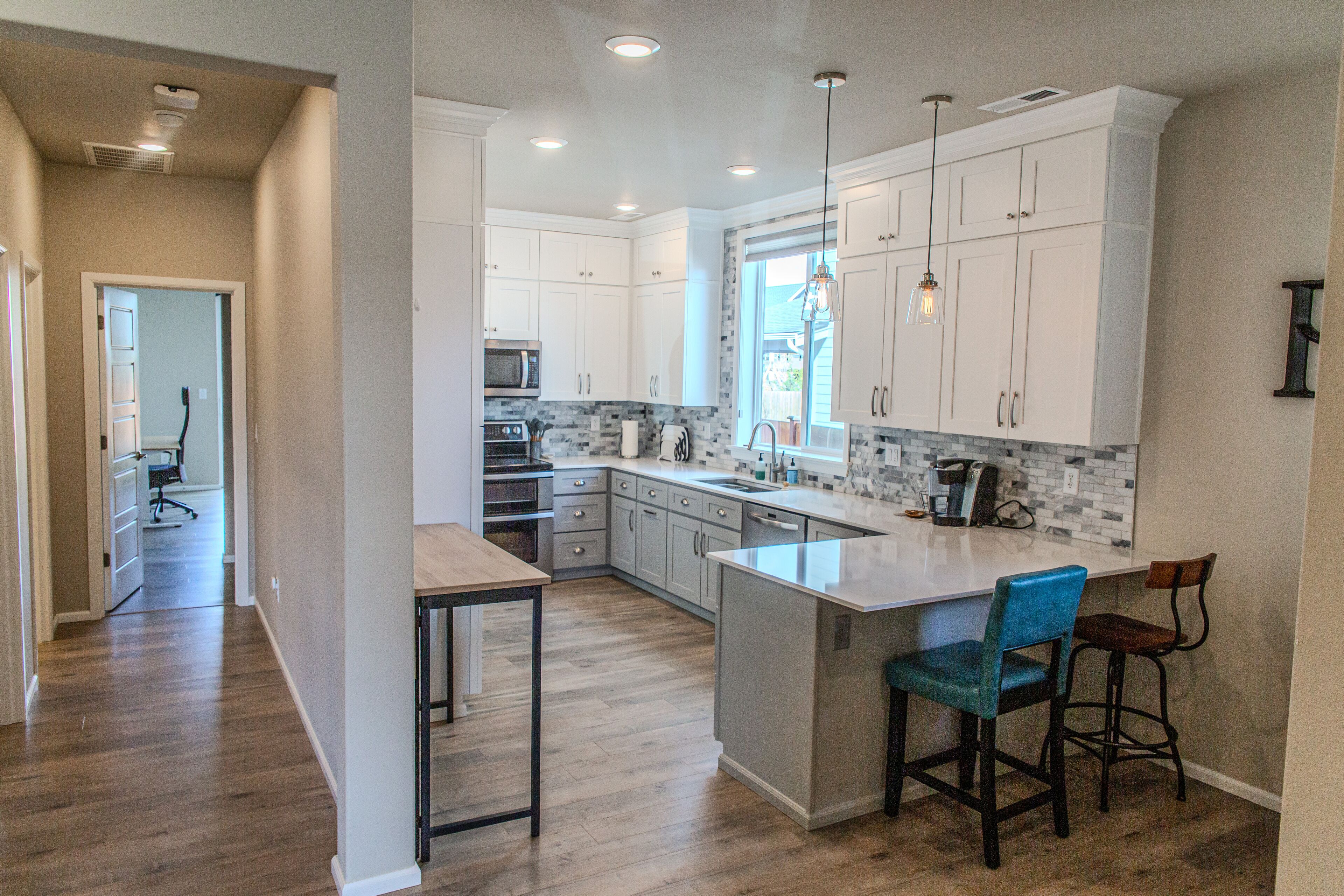 Modern 1 Bedroom Attached Apartment with separate driveway and entrance.