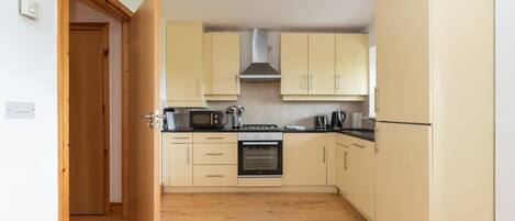 Fridge, microwave, dishwasher, coffee/tea maker