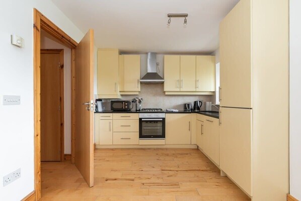 Fridge, microwave, dishwasher, coffee/tea maker