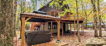 Hot Tub + Sauna + Deck + Firepit + Beach Access + Near Dining Grateful Escape by Avantstay