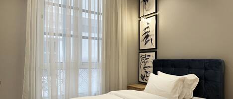 Apartamento design, 3 quartos | 3 quartos, cortinas blackout, ferros/tábuas de passar roupa