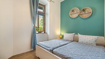 1 dormitorio, tabla de planchar con plancha, wifi gratis y ropa de cama