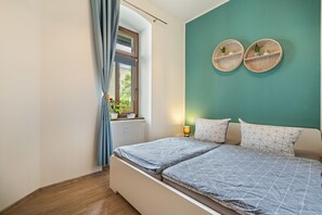 1 chambre, fer et planche à repasser, Wi-Fi gratuit, draps fournis