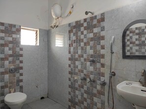 Comfort Room | Bathroom | Shower, rainfall showerhead, free toiletries, towels - Hotel Sea Sand (Kanthi)