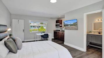 Iron/ironing board, travel crib, free WiFi, bed sheets