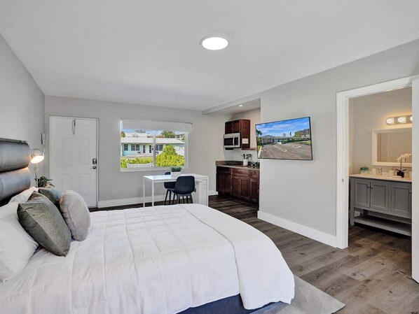 Iron/ironing board, travel crib, free WiFi, bed sheets