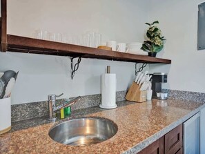 Fridge, microwave, stovetop, coffee/tea maker