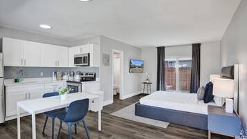 Iron/ironing board, travel crib, free WiFi, bed sheets