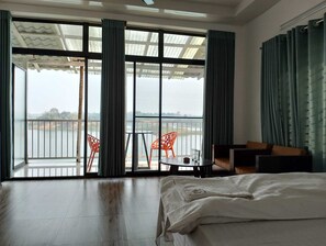 Enjoy a meal or relax on the balcony with a table and chairs.