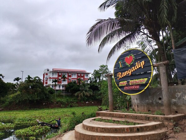 A sign for Rangadip resort, indicating it offers a restaurant and recreation facilities.